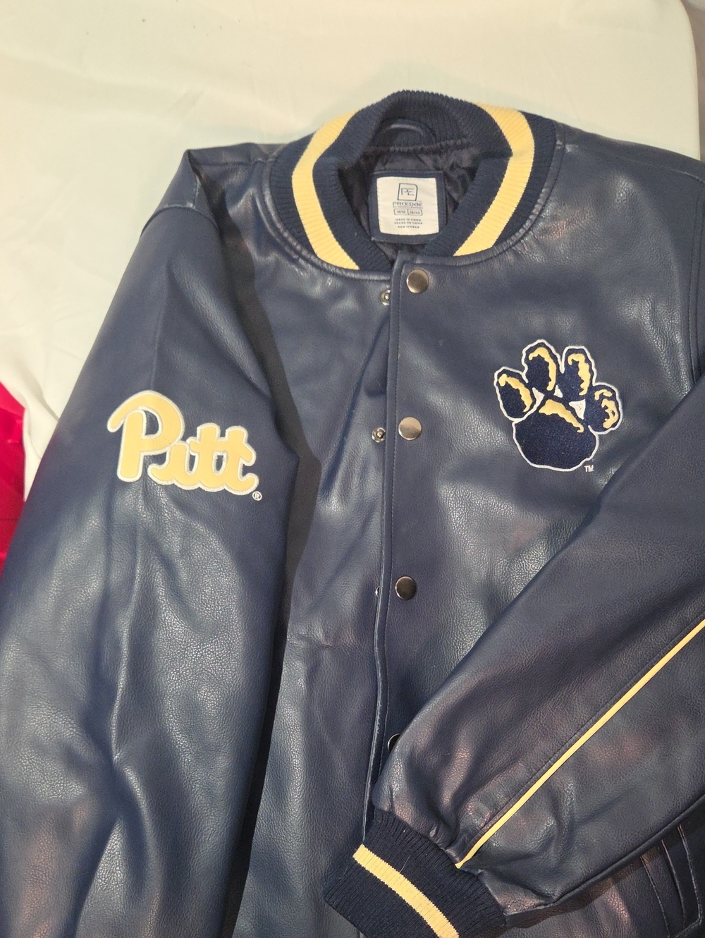 Pro Edge Navy and Gold Varsity Jacket with Paw Patch